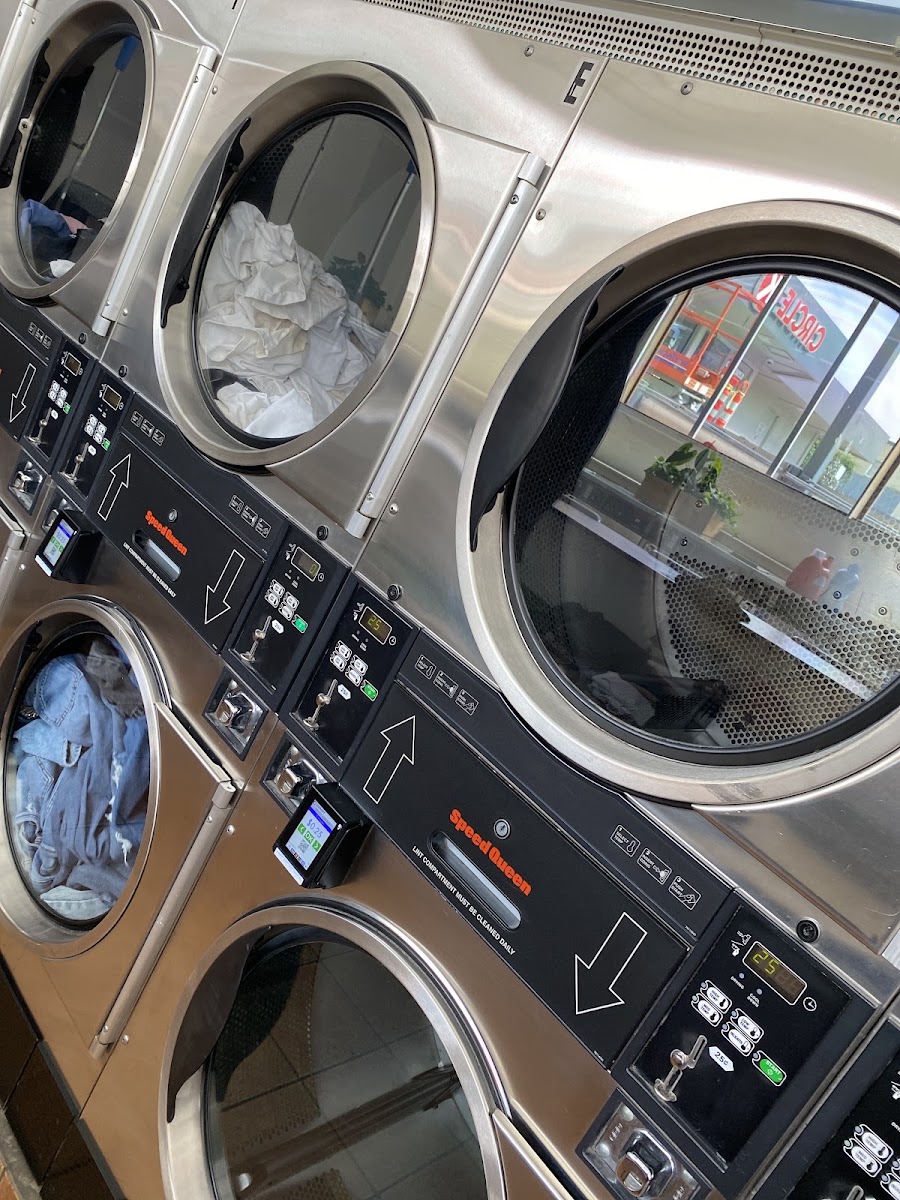 Front load dryers running at The Laundry Hub SF laundromat